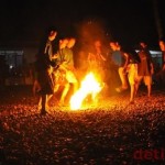 Play football with flaming coconuts in Indonesia